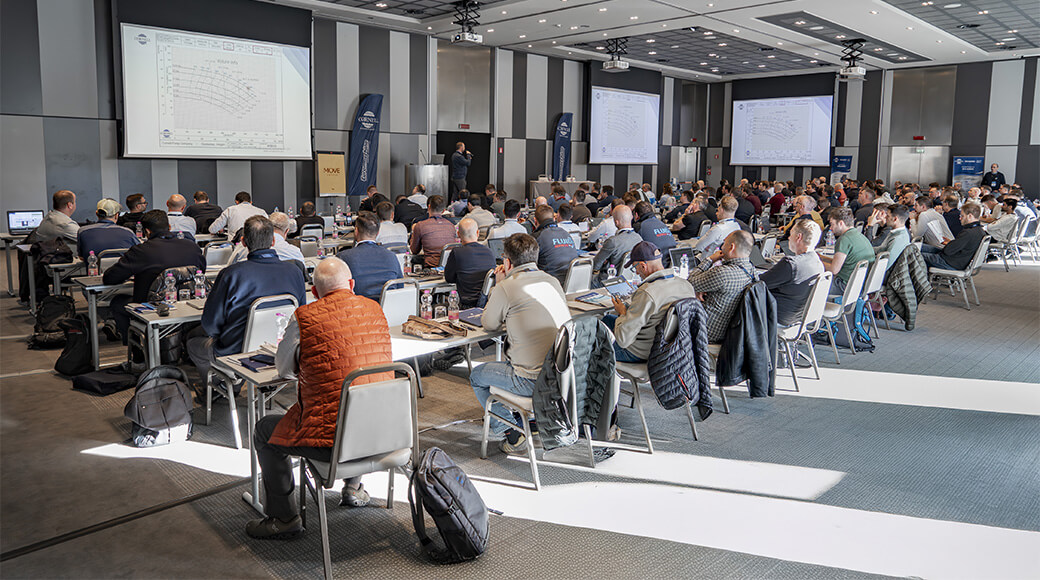 Conference room full of attendees during a technical training event