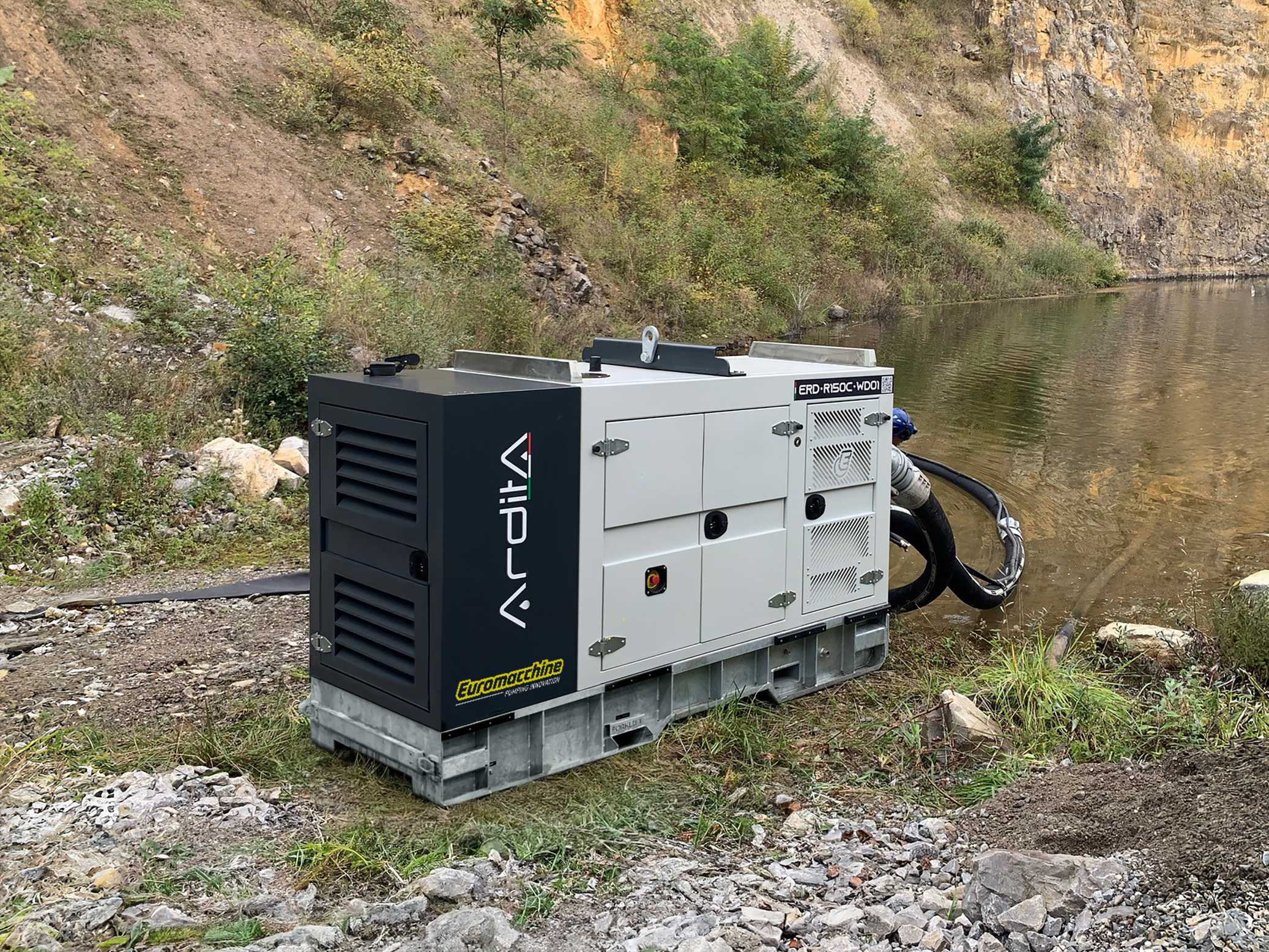 Euromacchine water transfer. Ardita pump unit working near a quarry pond for water transfer.