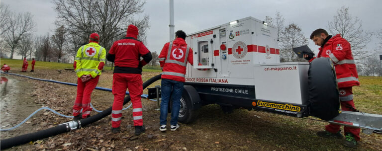 Euromacchine Lampo Emergency used by the Italian Red Cross: mobile pumping unit with light tower by a lake, Civil Protection